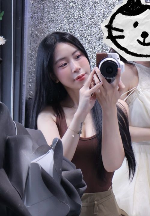 Woman with a camera in a mirror, choosing text chat with strangers instead of video